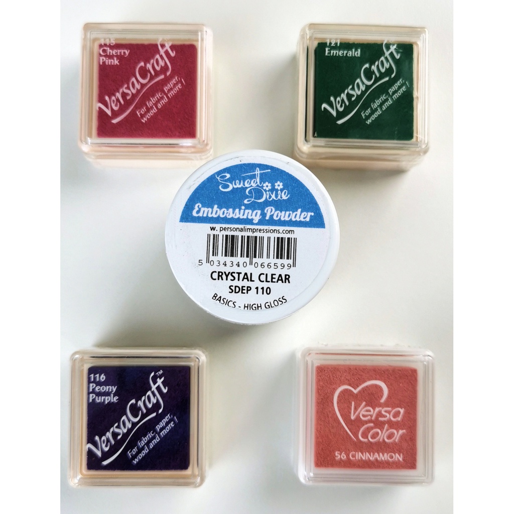 4 Versamark Minipads with a Clear Embossing Powder